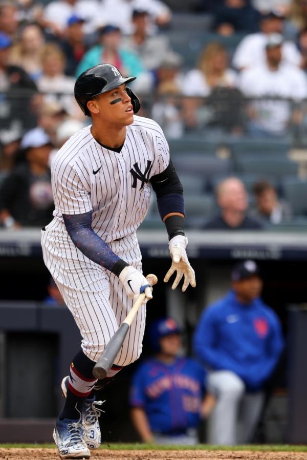 Aaron Judge #99 of the New York Yankees hits a home run during the sixth inning against the New York Mets in a game at Yankee Stadium on July 3, 2021