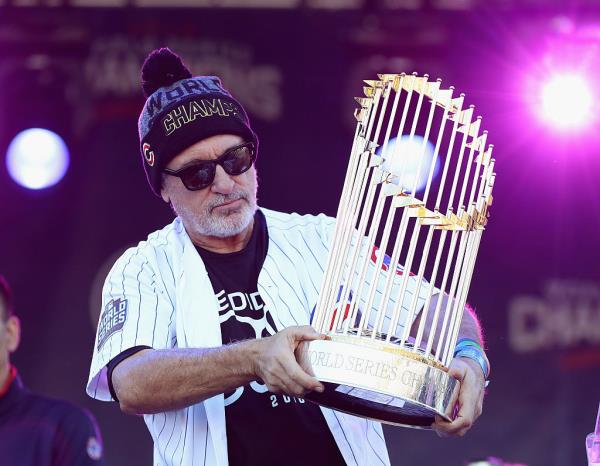Joe Maddon hoists World Series trophy after the Cubs won in 2016.