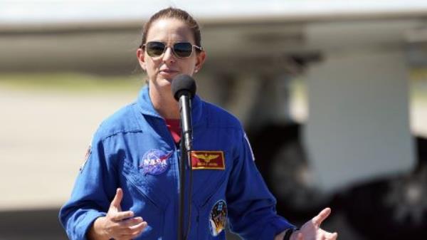 NASA astro<em></em>naut Nicole A. Mann speaks during a news co<em></em>nference at the Kennedy Space Center in Florida on October 1.